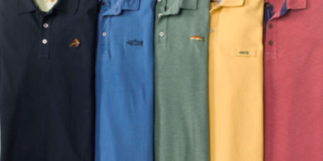 A row of five colorful Orvis polos.