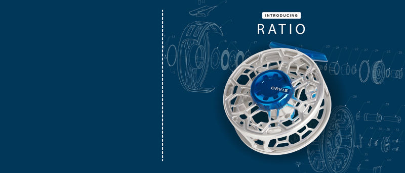 A silver and blue Ratio reel laid against a technical drawing background.