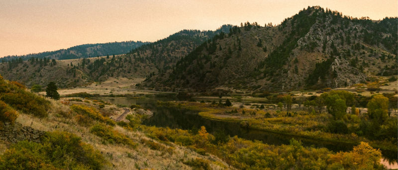 Beautiful Montana landscape with a placid river running between the mountains.