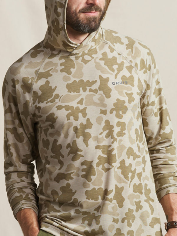 A model wearing a light olive camo Men&rsquo;s DriCast Hoodie.