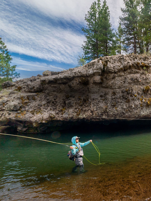 An angler casting on the Little Truckee River in California.