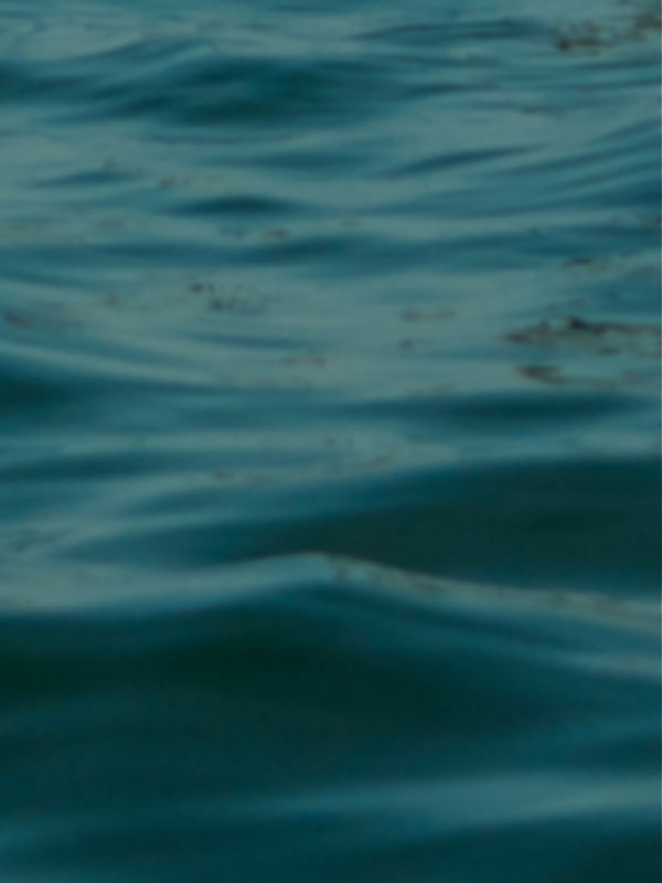 A close-up image of blue water rippling.
