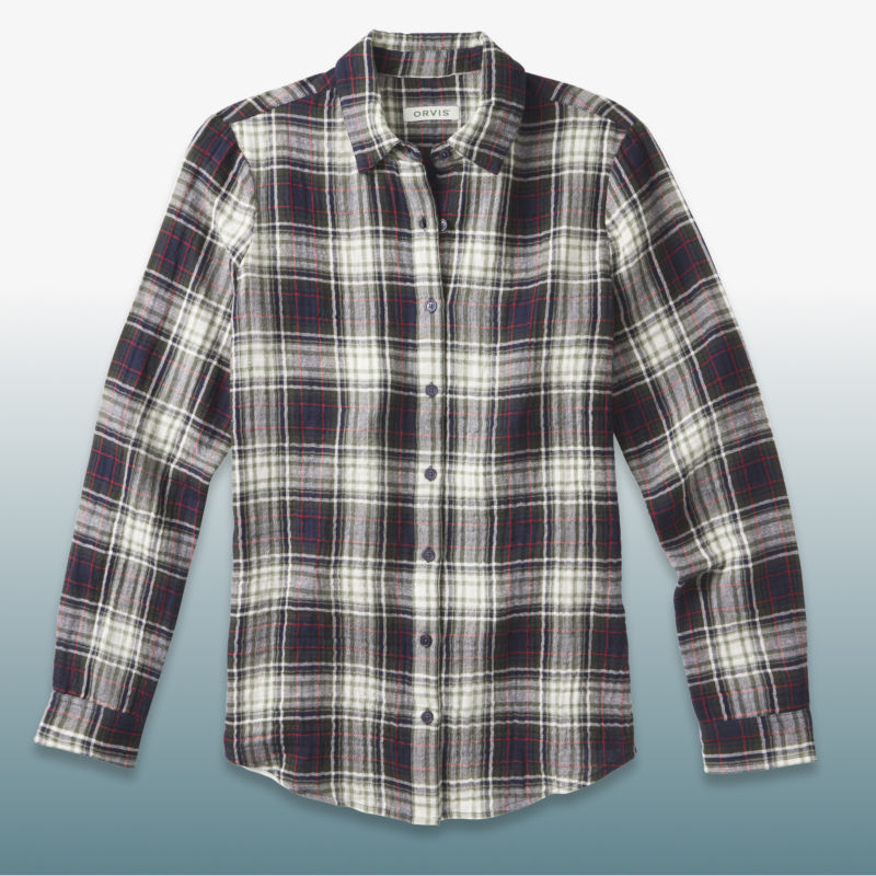 A black-and-white plaid button-down shirt laid over a blue gradient background.