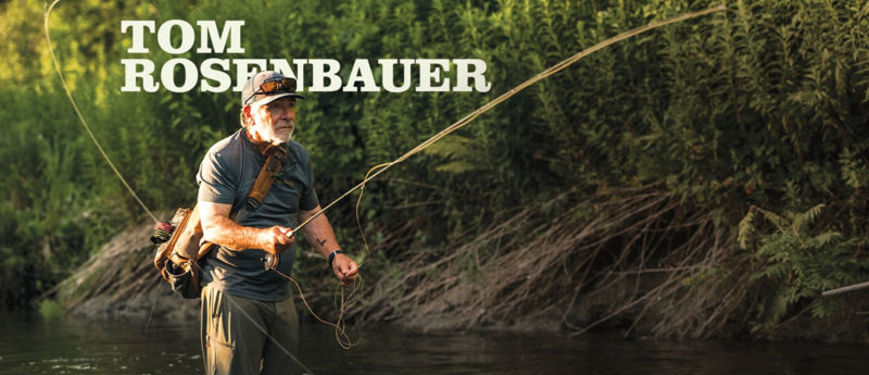 Tom Rosenbauer casting from knee-deep in a river.