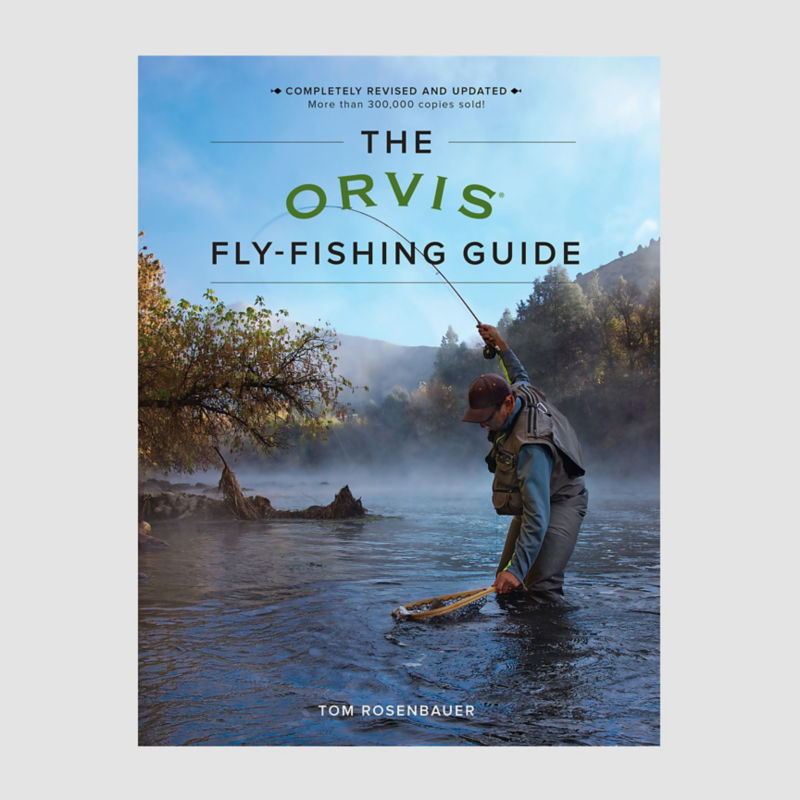 A book showing an angler with a net wading in the river