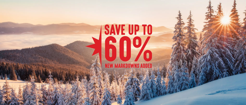 A bright, snowy, mountain-scape with the words Save up to 60%, new markdowns added.