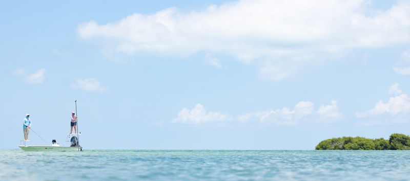 Two people fishing on the saltwater flats.