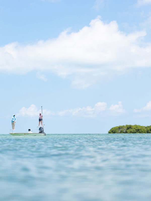 Two people fishing on the saltwater flats.