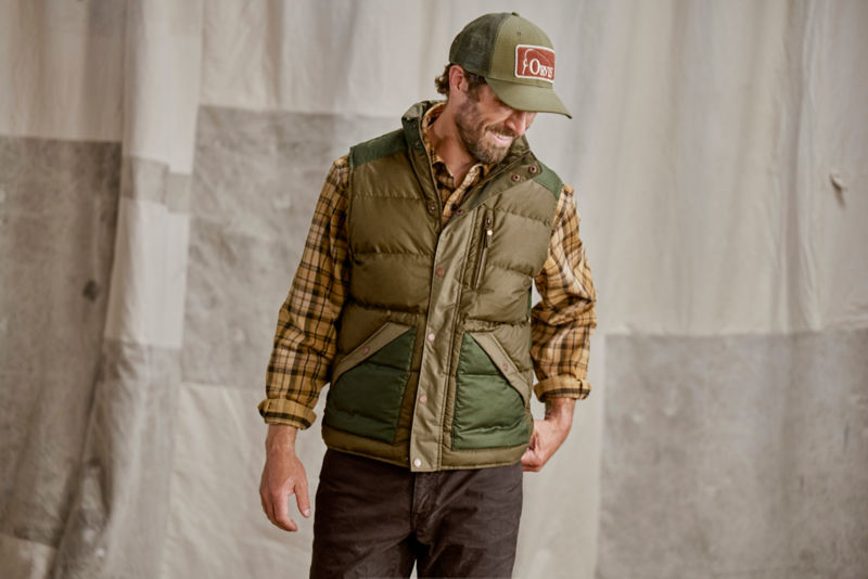 Man wearing yarn-dyed moleskin shirt and waxed down vest.