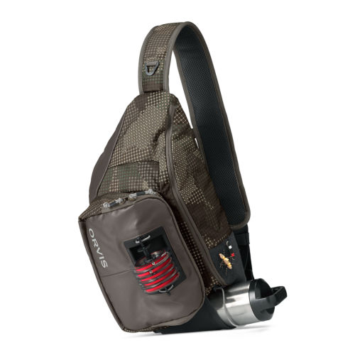 A fishing sling pack in a tech camouflage print