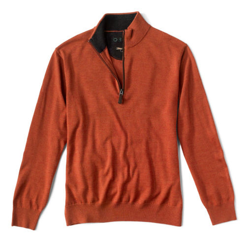 A dark orange quarter zip sweater.