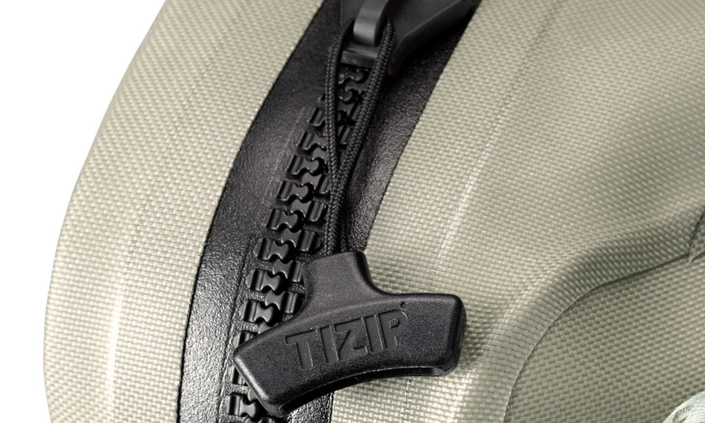 The TIZIP logo on a zipper-pull of a pack