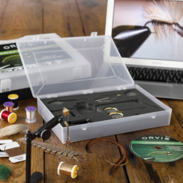 Orvis Premium Fly Tying Kit in action on a desk.