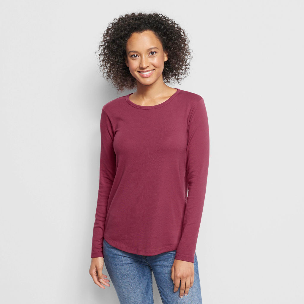 Woman poses in Long-Sleeved Relaxed Perfect Tee