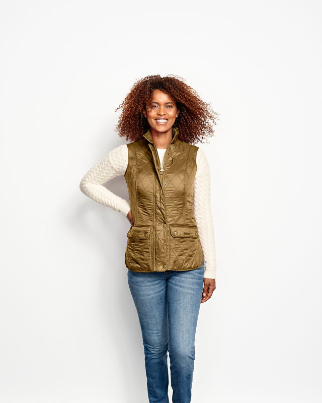 Woman in Barbour Wray Gilet wearing white sweater