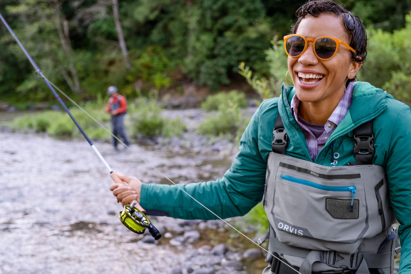 Faith casting her fly rod on the River.