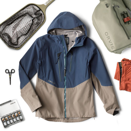 A collection of gifts with a color-blocked rain jacket in the center.