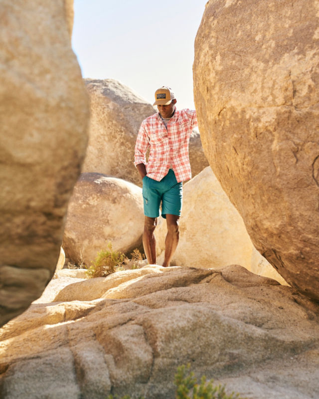 Man contemplates in desert canyon