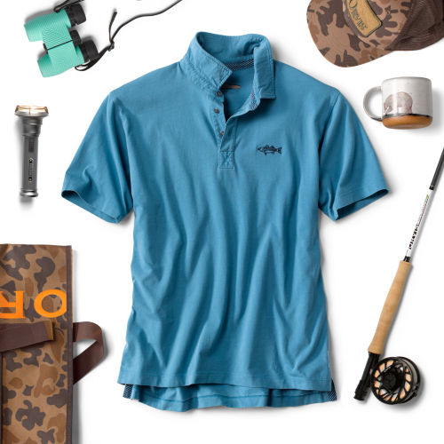A collection of gifts with a robin's egg blue polo in the center.