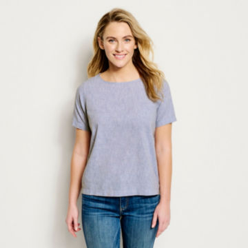 Woman in River Blue It’s-A-Balance Short-Sleeved Popover Shirt.