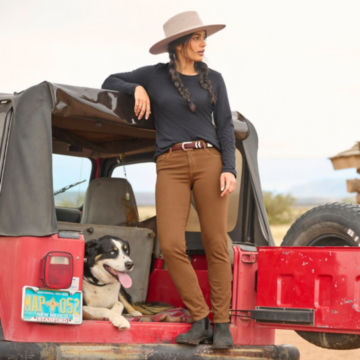 Woman in Perfect Relaxed Long-Sleeved Shirt stands on her Jeep.