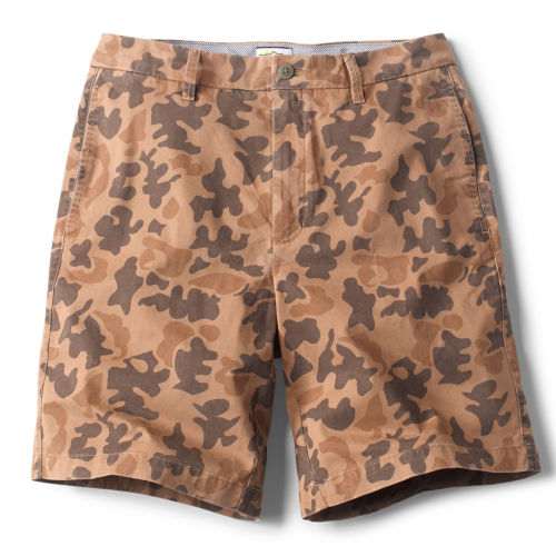 A pair of brown camo shorts.