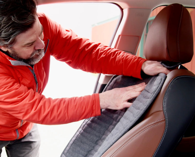 Man installs his Orvis Grip-Tight&reg; Bucket Seat Protector Video in his car. image number 3