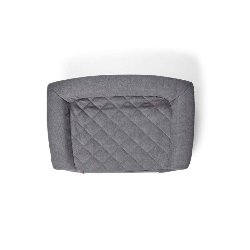 The diamond-quilted bottom of a gray RecoveryZone dog bed.
