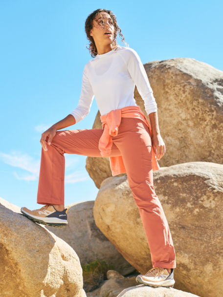Woman in Sedona Jackson Quick-Dry Pants boulders in the desert.