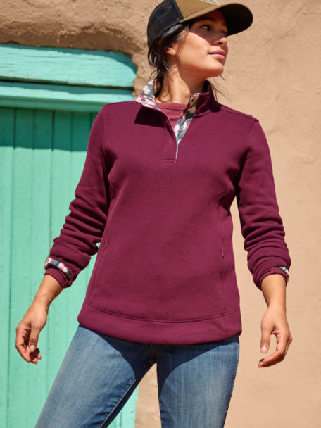 Woman in Signature Softest Snap Sweatshirt walks out into the desert.