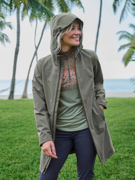 Woman near the beach wearing jacket over dri relase