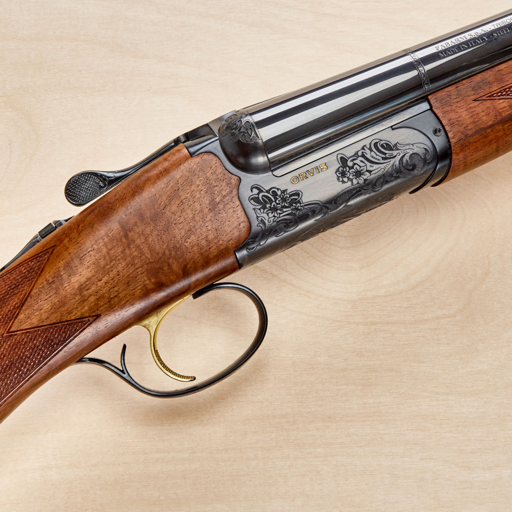 The Orvis Heritage Side-by-Side Shotgun detail of engraving on the stock.