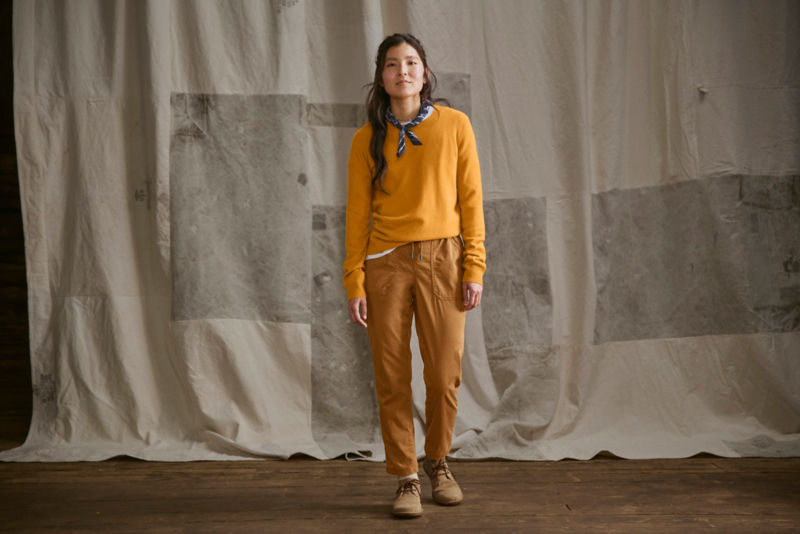 Model wearing sweater and pants