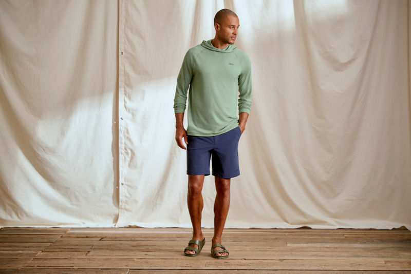 Man wearing green hoodie