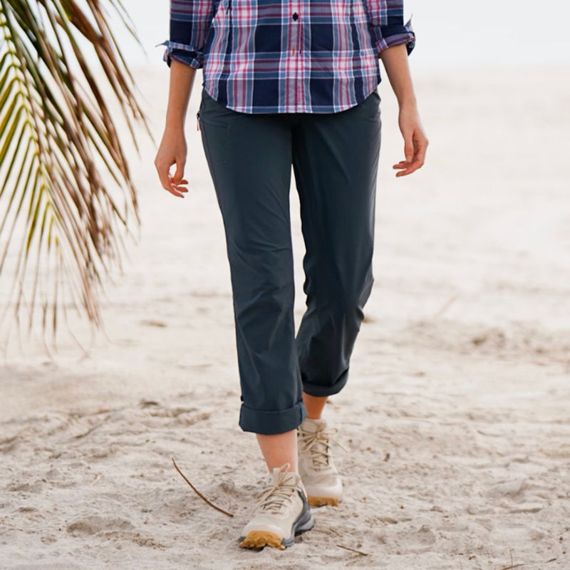 A woman in Jackson Quick-Dry Pants walks up the beach. image number 3