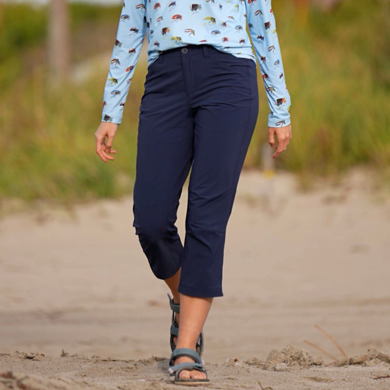 Woman in Jackson Quick-Dry Capris walks along a beach. image number 6