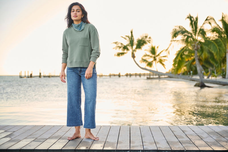 Woman standing on a dock