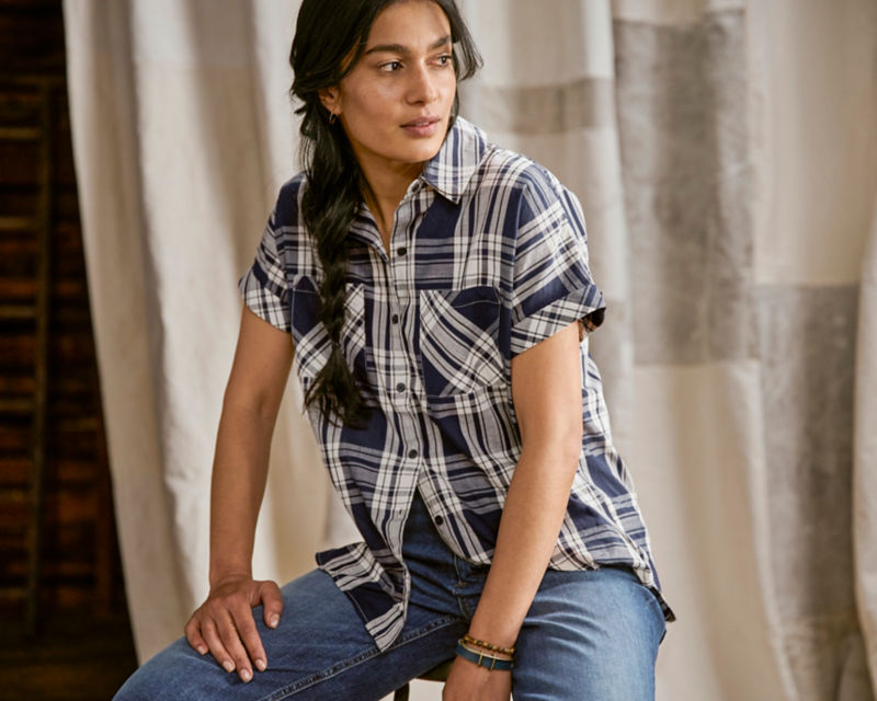 Woman in Easy Printed Short-Sleeved Camp Shirt with jeans