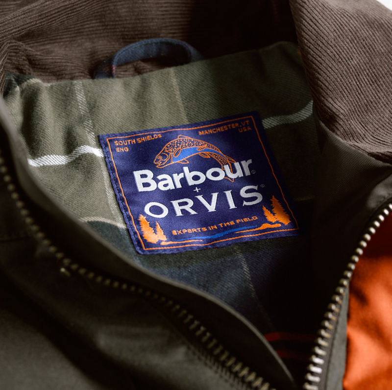 Up-close shot of Orvis + Barbour logo