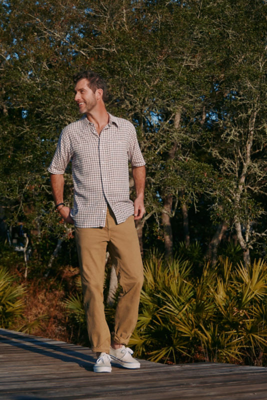 A waist-down view of a model wearing a pair of camel 5-Pocket Pants.