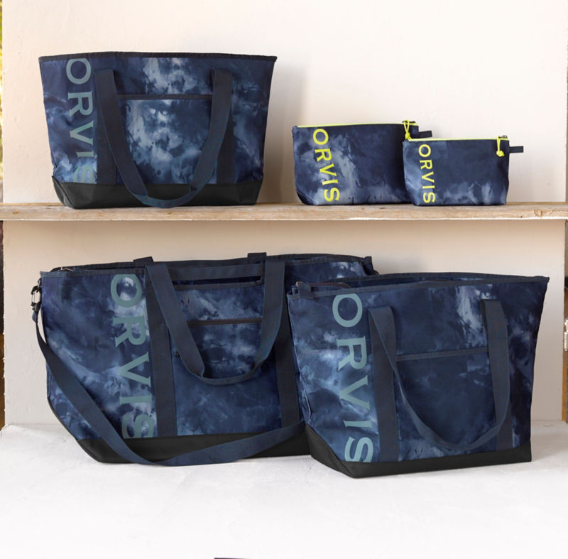 A collection of blue bags in various sizes.