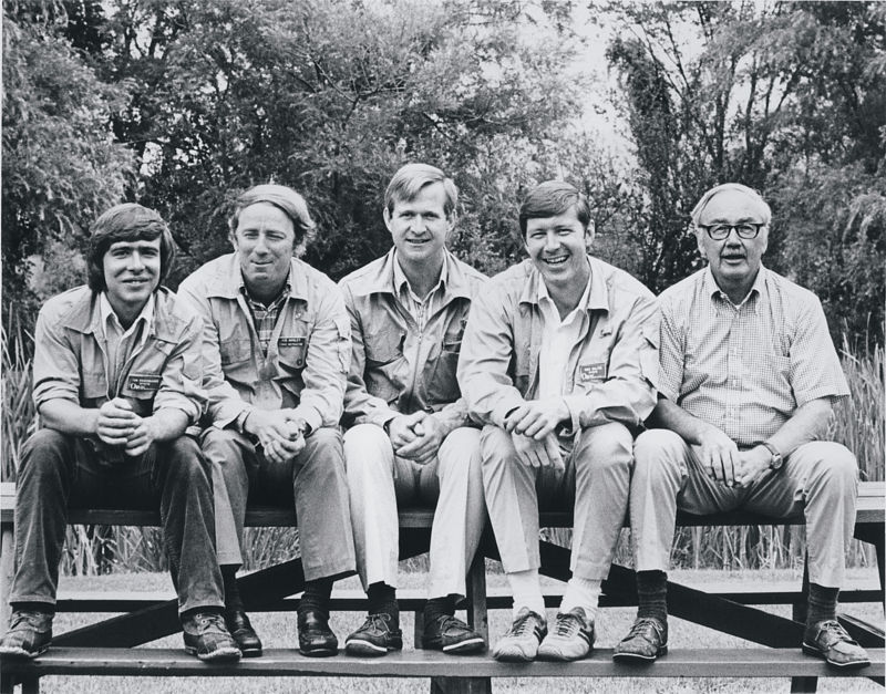 An old, grainy, black and white photo of Tom with other Orvis instructors