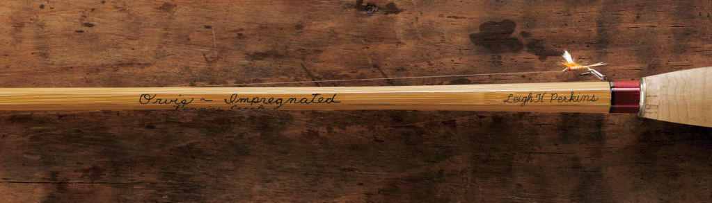 An old bamboo fly rod inscribed with the name Leigh H. Perkins