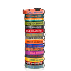 Stack of colorful personalized dog collars.