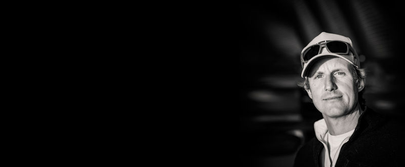 A black and white headshot of Reid Bryant.