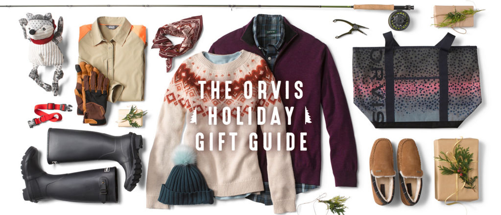 A knolled group of gifts such as holiday clothing to a fly rod and dog toys.