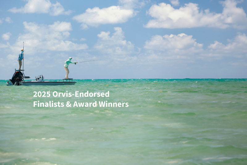 The text: 2025 Orvis-Endorsed Finalists & Award Winners overlaid on an image of an angler makes a long cast from a skiff while his guide looks on over tropical waters.