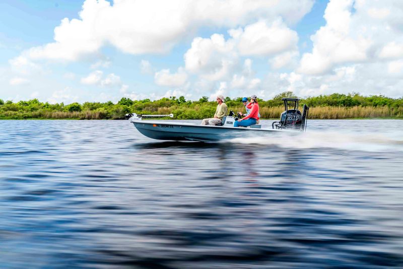 A boat glides through Lake Okeechobee