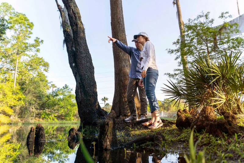Simon Perkins points out the sights to his cousin, Hannah Perkins