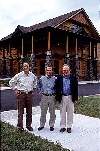 Leigh, Perk, and Dave standing outside the flagship store in Manchester, VT.